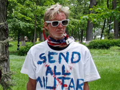 FILE PHOTO: Ryan W. Routh, a suspect identified by news organizations, as the FBI investigates what they said was an apparent assassination attempt in Florida on Republican presidential nominee and former U.S. President Donald Trump, is seen during a rally demanding China's leader's assistance to organise an extraction process for Ukrainian service members from Azovstal Iron and Steel Works in Mariupol, in Kyiv, Ukraine May 17, 2022. REUTERS/Valentyn Ogirenko/File Photo