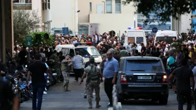 People gather outside a hospital as more than 1,000 people, including Hezbollah fighters and medics, were wounded when the pagers they use to communicate exploded across Lebanon, according to a security source, in Beirut, Lebanon September 17, 2024. REUTERS/Mohamed Azakir