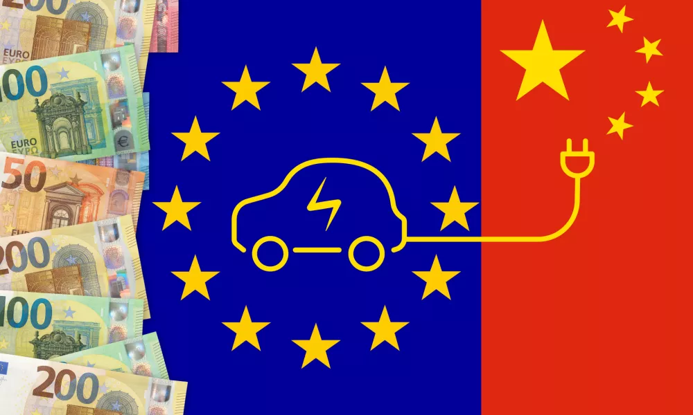 Euros notes on a European union flag background. Taxes for chinese electric cars import in Europe Union. EU and China trade war