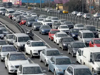 Istanbul, Turkey - February 8, 2014: Cars driving on Zincirlikuyu District in istanbul. Heavy traffic moves slowly on a Zincirlikuyu district in İstanbul are usually crowded.