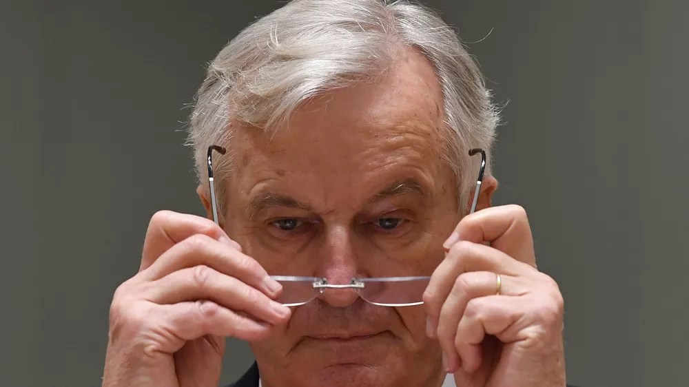 ﻿European Union's chief Brexit negotiator Michel Barnier takes off his glasses prior to speaking during a meeting of EU ambassadors in Brussels, Tuesday, Dec. 22, 2020. Problems increased Monday in the bid to put a trade deal between the European Union and the United Kingdom before a Brexit transition period ends on New Year's Day, with the EU legislature insisting it will not have time to approve a deal. (John Thys, Pool via AP)