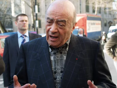 Mohamed al Fayed, the owner of the Harrods department stores gestures while making a statement outside the high court in London Wednesday March 21, 2007,before attending a preliminary hearing in the inquest into the death of his son Dodi Fayed and Princess Diana. Lawyers representing al Fayed asked a coroner Wednesday to order the police to hand over all documents and interviews from the force's three-year investigation into the deaths his son and the princess. (AP Photo/ Max Nash)