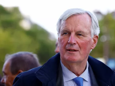 FILE PHOTO: France's Prime minister Michel Barnier looks on during a parade of French athletes who participated in the 2024 Olympics and Paralympics in Paris, France September 14, 2024. REUTERS/Sarah Meyssonnier/Pool/File Photo