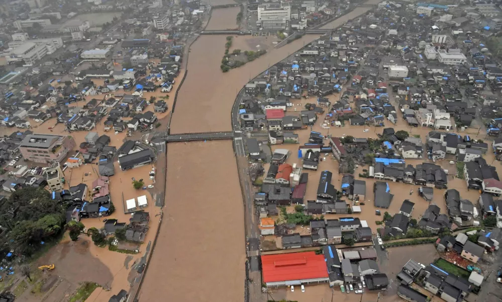 An aerial view taken by a helicopter shows a flooded residential area caused by torrential rain in Wajima, Ishikawa Prefecture, Japan September 21, 2024, in this photo taken by Kyodo. Mandatory credit Kyodo/via REUTERS  ATTENTION EDITORS - THIS IMAGE HAS BEEN SUPPLIED BY A THIRD PARTY. MANDATORY CREDIT. JAPAN OUT. NO COMMERCIAL OR EDITORIAL SALES IN JAPAN.   TPX IMAGES OF THE DAY