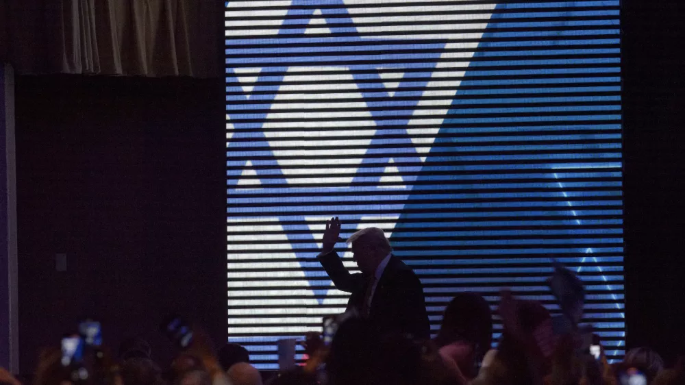 Former President Donald Trump makes his exit following his speech during the Israeli American Council 9th Annual National Summit at the Washington Hilton in Washington, Thursday, Sept. 19, 2024. (AP Photo/Rod Lamkey, Jr.)