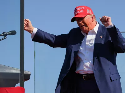 Republican presidential nominee and former U.S. President Donald Trump gestures at a campaign rally in Wilmington, North Carolina, U.S., September 21, 2024. REUTERS/Brian Snyder