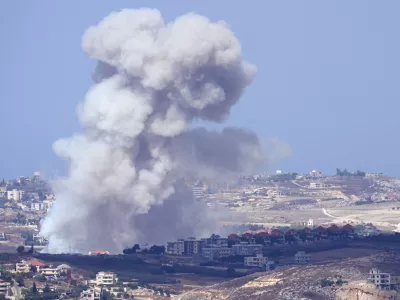 Smoke rises from Israeli airstrikes on villages in the Nabatiyeh district, seen from the southern town of Marjayoun, Lebanon, Monday, Sept. 23, 2024.(AP Photo/Hussein Malla)