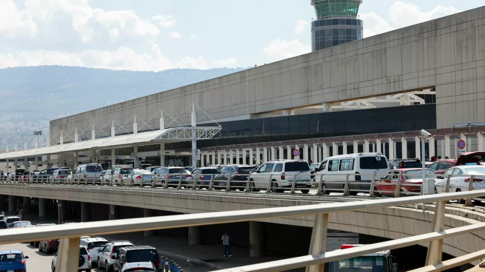 Vehicles drive outside Beirut-Rafic Hariri International Airport, in Beirut, Lebanon September 23, 2024. REUTERS/Mohamed Azakir