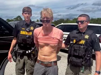 FILED - 15 September 2024, US, Martin County: A screenshot from video shows Ryan Wesley Routh, accused attempted assassin suspect of former US President Donald Trump, is apprehended by Martin County Sheriff's Office. The Martin County Sheriff's Office shared a photo Monday from a September 15, 2024 traffic stop of the moment deputies arrested suspect Routh on Sunday afternoon. Photo: -/Martin County Sheriff's Office via ZUMA Press Wire/dpa