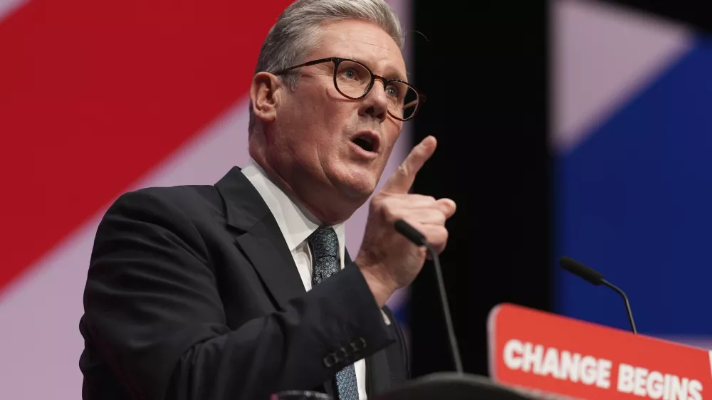 Britain's Prime Minister Keir Starmer addresses members at the Labour Party Conference in Liverpool, England, Tuesday, Sept. 24, 2024.(AP Photo/Jon Super)