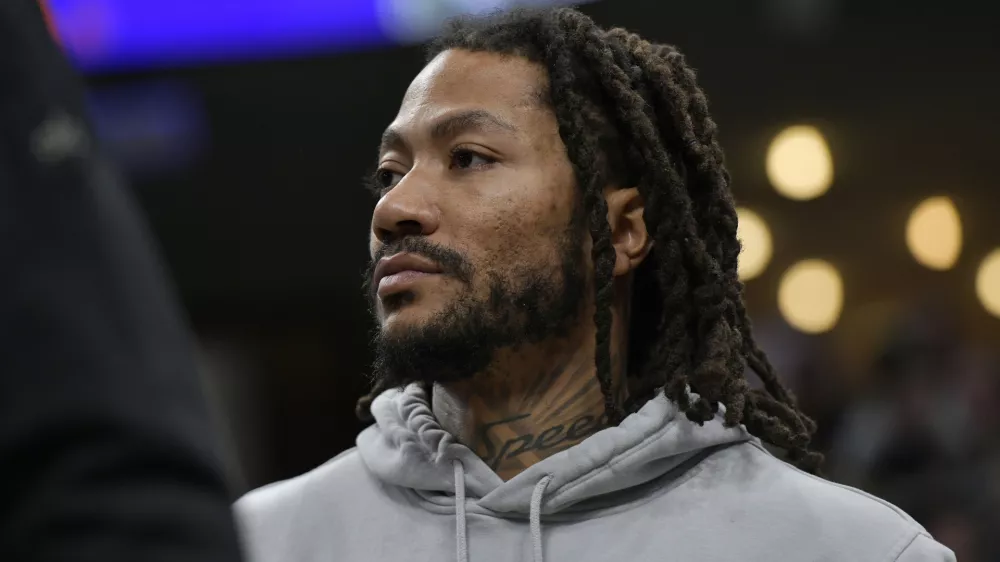 FILE -Memphis Grizzlies guard Derrick Rose stands on the sideline in the second half of an NBA basketball game against the Milwaukee Bucks, Feb. 15, 2024, in Memphis, Tenn. (AP Photo/Brandon Dill, File)