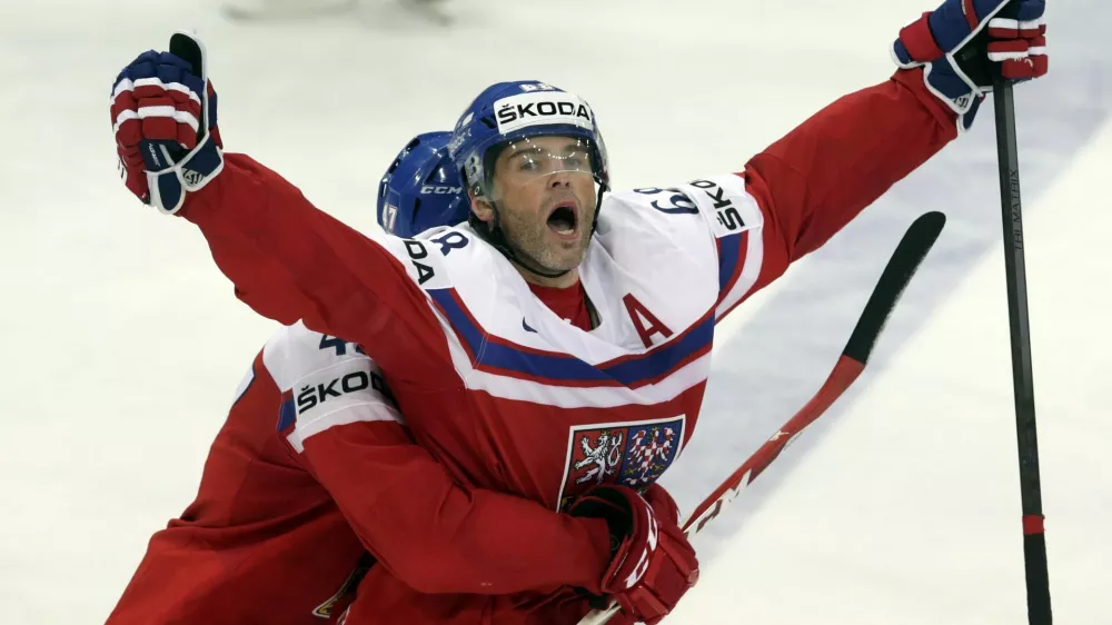 ﻿Jaromir Jagr (R) of the Czech Republic celebrates with his teammate Michal Jordan after scoring a goal against Finland during their Ice Hockey World Championship quarterfinal game at the O2 arena in Prague, Czech Republic May 14, 2015. REUTERS/David W Cerny