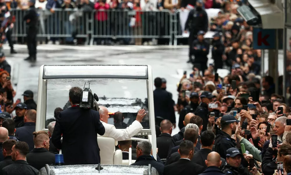 Pope Francis waves from the popemobile, during his one-day apostolic journey in Luxembourg September 26, 2024. REUTERS/Yves Herman