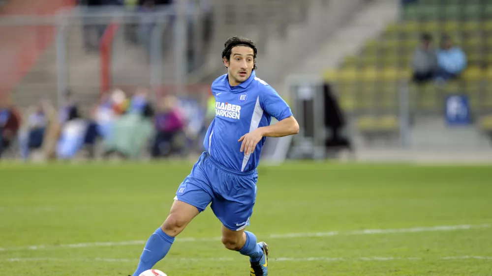 FILED - 13 February 2011, Karlsruhe: Then Karlsruhe's Serhat Akin Germany 2nd Bundesliga soccer match between Karlsruher SC and Hertha BSC at the Wildparkstadion in Karlsruhe. Photo: picture alliance / dpa