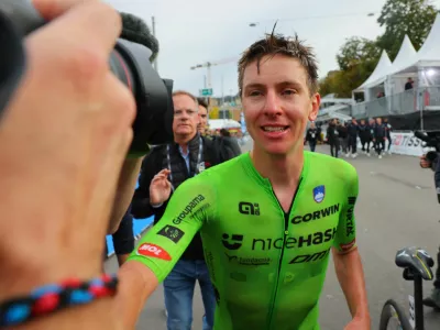 Cycling - UCI World Championships 2024 - Men's Elite Road Race - Zurich, Switzerland - September 29, 2024 Slovenia's Tadej Pogacar reacts after winning the race REUTERS/Denis Balibouse