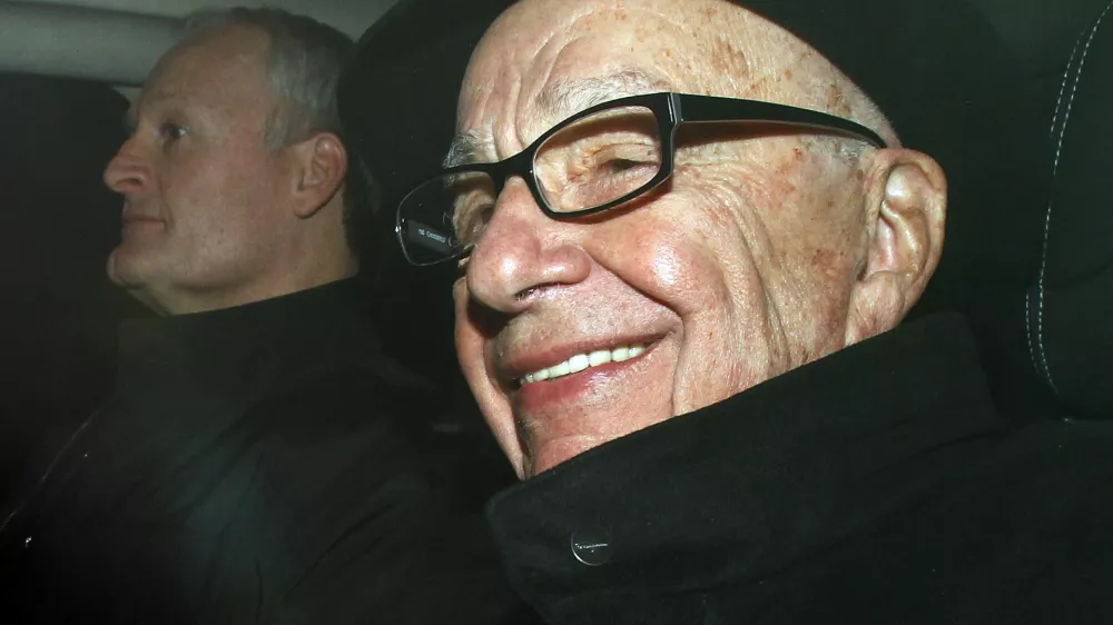 News Corp Chief Executive and Chairman Rupert Murdoch arrives in central London February 16, 2012. REUTERS/Stefan Wermuth (BRITAIN - Tags: BUSINESS CRIME LAW)