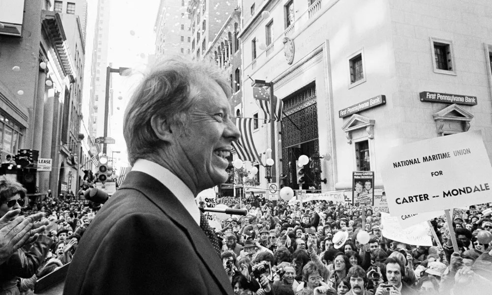 FILE - An estimated crowd of 35,000 people gather for a noontime speech by Presidential candidate Jimmy Carter in downtown Philadelphia, Oct. 29, 1976. (AP Photo, File)