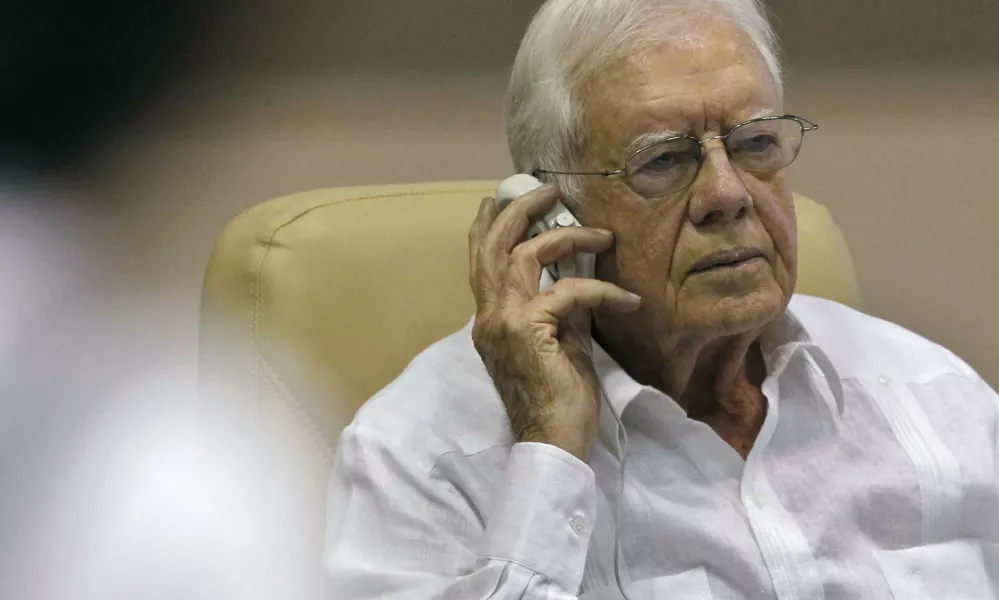 Former U.S. President Jimmy Carter attends a news conference in Havana March 30, 2011.Carter met with leading Cuban dissidents on Wednesday and told them he expected to visit imprisoned U.S. aid contractor Alan Gross before leaving the communist-ruled island. REUTERS/Enrique De La Osa (CUBA - Tags: POLITICS)