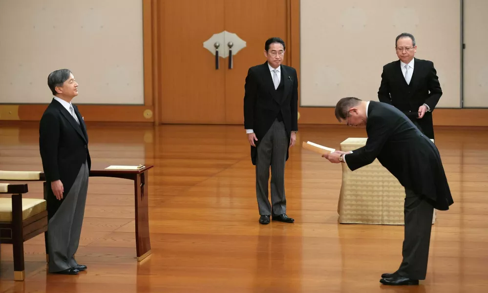 Japan's Emperor Naruhito stands as new Prime Minister Shigeru Ishiba bows deeply while former prime minister Fumio Kishida looks on, during Ishiba's attestation ceremony at the Imperial Palace in Tokyo, Japan October 1, 2024, in this photo released by Kyodo. Mandatory credit Kyodo/via REUTERS ATTENTION EDITORS - THIS IMAGE WAS PROVIDED BY A THIRD PARTY. MANDATORY CREDIT. JAPAN OUT. NO COMMERCIAL OR EDITORIAL SALES IN JAPAN.