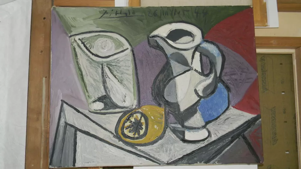 The artwork "Verre et Pichet" by Pablo Picasso is seen in this undated handout photograph released by the Serbian Police, in Belgrade. Police in Serbia have recovered two paintings by Pablo Picasso stolen in 2008 from a gallery in Switzerland. Serbia's Interior Minister Ivica Dacic told reporters the paintings -- "Tete de Cheval (Horse's Head)'' and "Verre et Pichet (Glass and Pitcher)'' -- were found in Belgrade. The paintings, worth millions of dollars, were snatched from a gallery in the Swiss town of Pfaeffikon, near Zurich. REUTERS/Serbia's Police/Handout (SERBIA - Tags: CRIME LAW SOCIETY) FOR EDITORIAL USE ONLY. NOT FOR SALE FOR MARKETING OR ADVERTISING CAMPAIGNS. THIS IMAGE HAS BEEN SUPPLIED BY A THIRD PARTY. IT IS DISTRIBUTED, EXACTLY AS RECEIVED BY REUTERS, AS A SERVICE TO CLIENTS