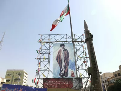 FILE PHOTO: An Iranian missile system is displayed next to a banner with a picture of Iran's Supreme Leader Ayatollah Ali Khamenei and the late Lebanon's Hezbollah leader Hassan Nasrallah, in a street in Tehran, Iran, October 2, 2024. Majid Asgaripour/WANA (West Asia News Agency) via REUTERS ATTENTION EDITORS - THIS IMAGE HAS BEEN SUPPLIED BY A THIRD PARTY/File Photo