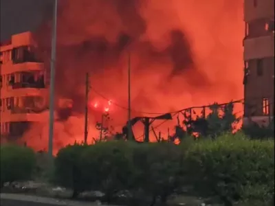 Smoke and flames rise near the hotel Beirut Golden Plaza, following an airstrike amid ongoing hostilities between Hezbollah and Israeli forces, in Beirut, Lebanon October 5, 2024, in this screengrab obtained from a social media video. SOCIAL MEDIA/via REUTERS THIS IMAGE HAS BEEN SUPPLIED BY A THIRD PARTY. NO RESALES. NO ARCHIVES.