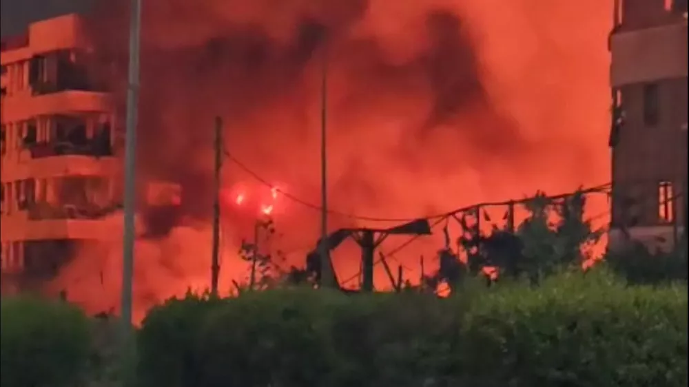 Smoke and flames rise near the hotel Beirut Golden Plaza, following an airstrike amid ongoing hostilities between Hezbollah and Israeli forces, in Beirut, Lebanon October 5, 2024, in this screengrab obtained from a social media video. SOCIAL MEDIA/via REUTERS THIS IMAGE HAS BEEN SUPPLIED BY A THIRD PARTY. NO RESALES. NO ARCHIVES.