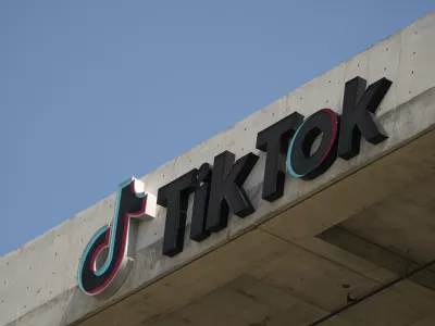 FILE - The TikTok logo is seen on their building in Culver City, Calif., March 11, 2024. (AP Photo/Damian Dovarganes, File)