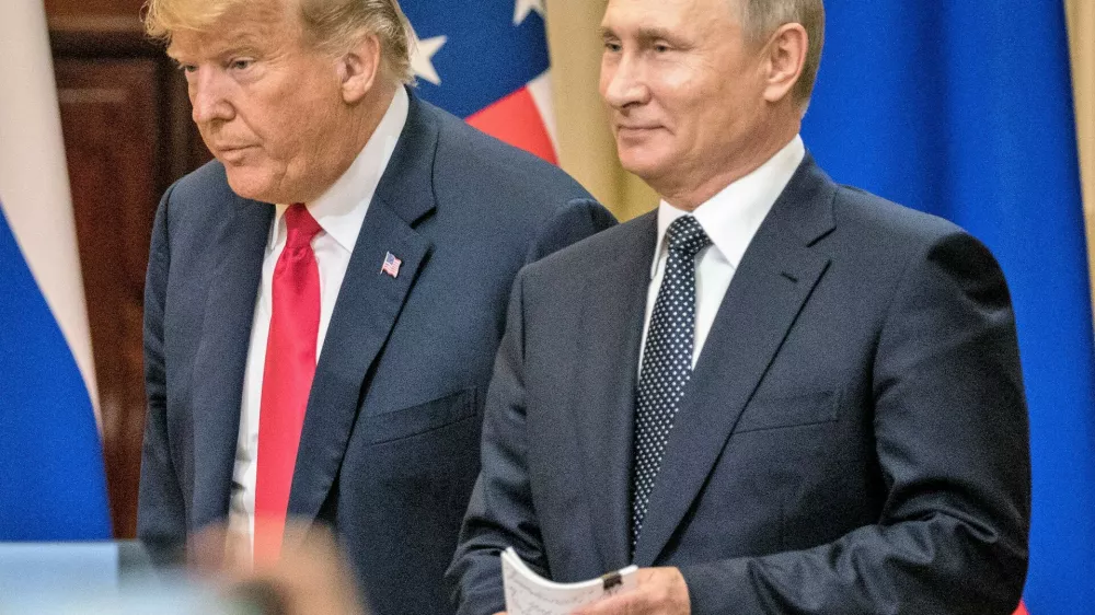 HELSINKI, FINLAND - JULY 16: U.S. President Donald Trump (L) and Russian President Vladimir Putin arrive to waiting media during a joint press conference after their summit on July 16, 2018 in Helsinki, Finland. The two leaders met one-on-one and discussed a range of issues including the 2016 U.S Election collusion. (Photo by Chris McGrath/Getty Images)