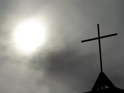 ﻿FILE - In this April 8, 2010 file photo a cross sits on top of a church in Berlin, Germany. A leading German magazine says a report on sexual abuse inside the Catholic Church in Germany details 3,677 abuses cases by Catholic clergy between 1946 and 2014. Spiegel Online wrote Wednesday, Sept. 12, 2018 the report it obtained â€" commissioned by the German Bishops Conference and researched by three universities â€" concludes that more than half of the victims were 13 or younger and most were boys. (AP Photo/Markus Schreiber, File)