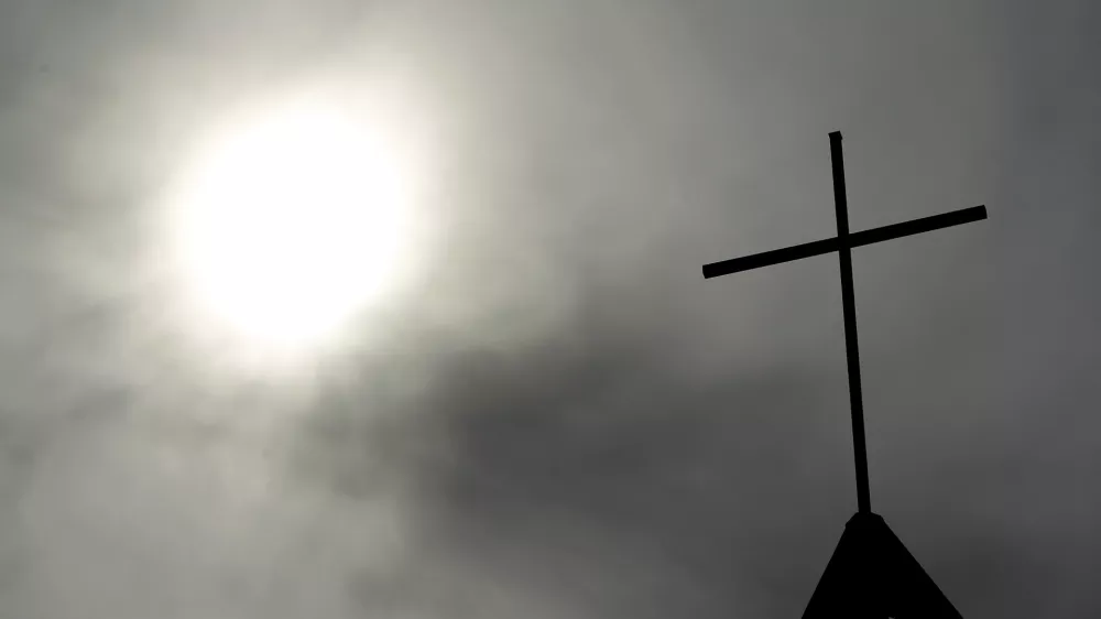 ﻿FILE - In this April 8, 2010 file photo a cross sits on top of a church in Berlin, Germany. A leading German magazine says a report on sexual abuse inside the Catholic Church in Germany details 3,677 abuses cases by Catholic clergy between 1946 and 2014. Spiegel Online wrote Wednesday, Sept. 12, 2018 the report it obtained â€" commissioned by the German Bishops Conference and researched by three universities â€" concludes that more than half of the victims were 13 or younger and most were boys. (AP Photo/Markus Schreiber, File)