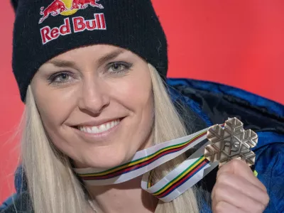 FILED - 10 February 2019, Sweden, Are: USA's Lindsey Vonn celebrates on the award ceremony with a bronze medal of the women's downhill race during the FIS Alpine World Ski Championships. Four-time alpine skiing World Cup champion Lindsey Vonn is considering a comeback in Beaver Creek in December, the Blick newspaper reported. Photo: Michael Kappeler/dpa