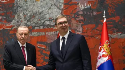 Turkey's President Recep Tayyip Erdogan, left, shakes hands with his Serbian counterpart Aleksandar Vucic during their meeting in Belgrade, Serbia, Friday, Oct. 11, 2024. (AP Photo/Darko Vojinovic)