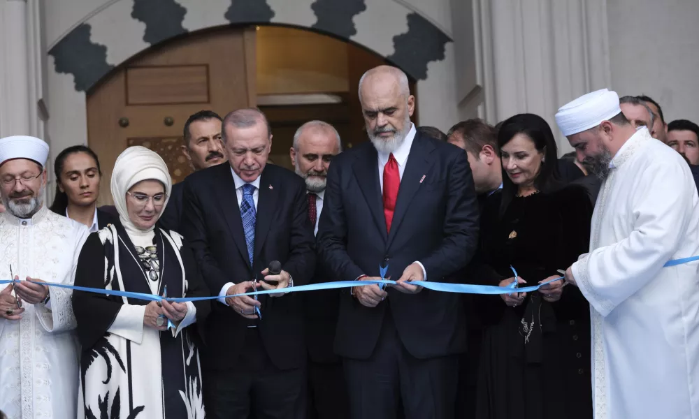 Turkish President Tayyip Erdogan, centrer left, next to his wife Emine Erdogan, second left, and Albania's Prime Minister Edi Rama, center right, during the inauguration of The Turkish-funded new Namazgah mosque, one of the largest in the Balkans in Tirana, Albania Thursday, Oct. 10, 2024. (AP Photo/Vlasov Sulaj)