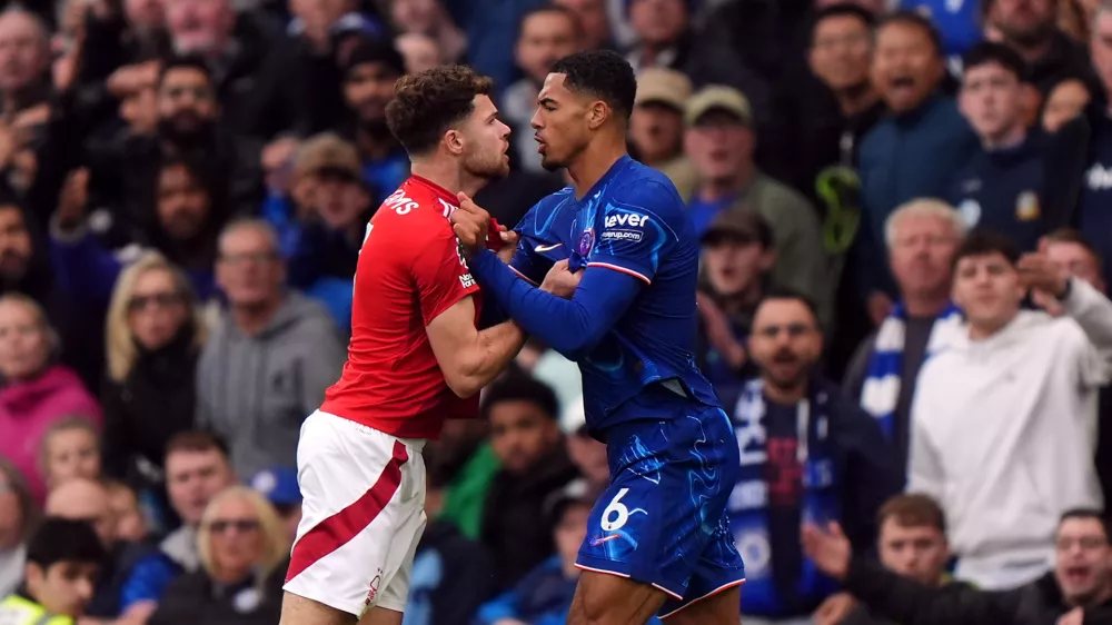 FILED - 06 October 2024, United Kingdom, London: Tempers flare between Nottingham Forest's Neco Williams and Chelsea's Levi Colwill during the English Premier League soccer match between Chelsea and Nottingham Forest at Stamford Bridge. Photo: Bradley Collyer/PA Wire/dpa