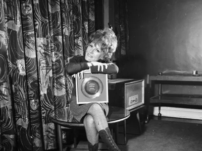 1st March 1965: English singer Petula Clark with a gold disc for her song 'Downtown'. (Photo by R. McPhedran/Express/Getty Images)