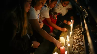 Fans place candles outside the hotel where Liam Payne, former One Direction member, was found dead, in Buenos Aires, Argentina, October 16, 2024. REUTERS/Agustin Marcarian