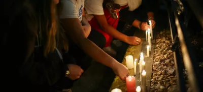 Fans place candles outside the hotel where Liam Payne, former One Direction member, was found dead, in Buenos Aires, Argentina, October 16, 2024. REUTERS/Agustin Marcarian