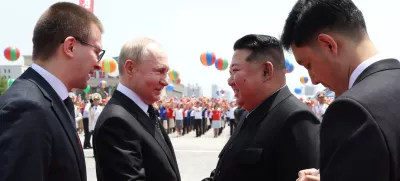 HANDOUT - 19 June 2024, North Korea, Pyongyang: North Korean leader Kim Jong-un and Russian President Vladimir Putin attend a welcoming ceremony at Kim Il Sung Square. Photo: -/Kremlin/dpa - ATTENTION: editorial use only and only if the credit mentioned above is referenced in full