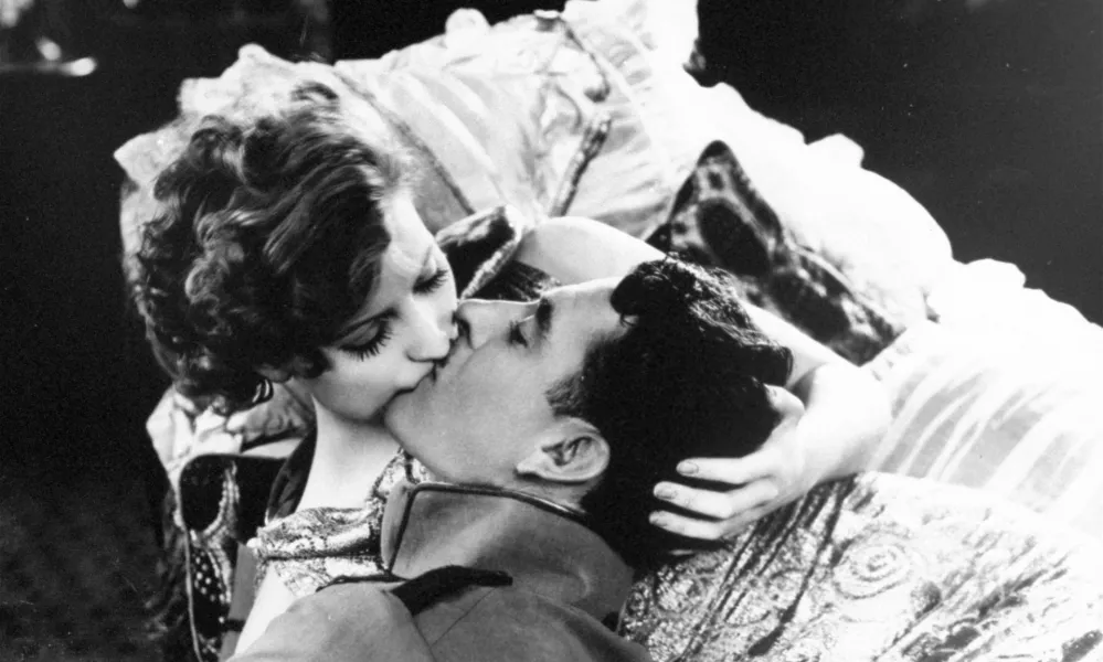 John Gilbert and Greta Garbo kiss in the 1927 film "Flesh and the Devil". (AP Photo)