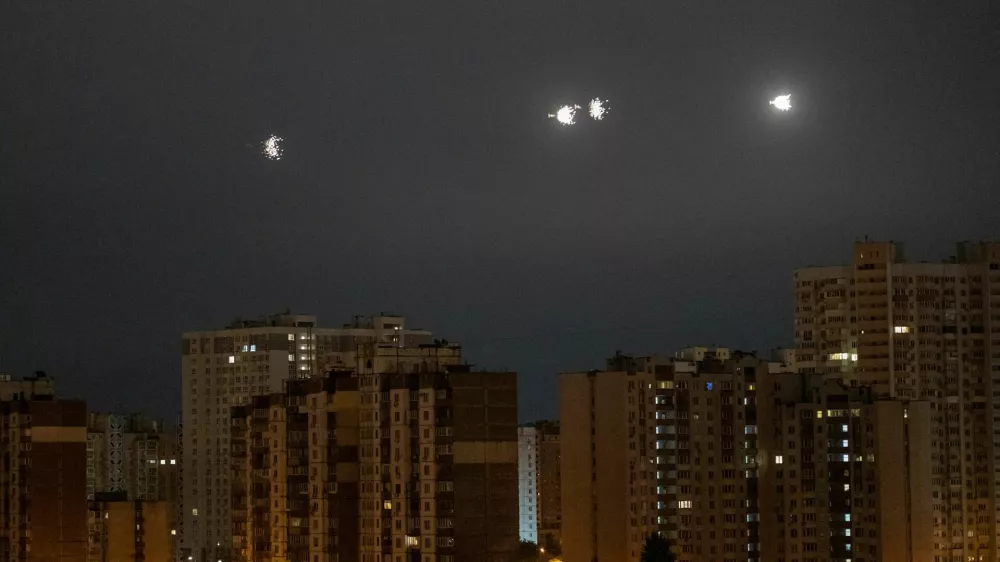 An explosion is seen in the sky over the city during a Russian drone strike, amid Russia's attack on Ukraine, in Kyiv, Ukraine October 19, 2024. REUTERS/Vladyslav Sodel