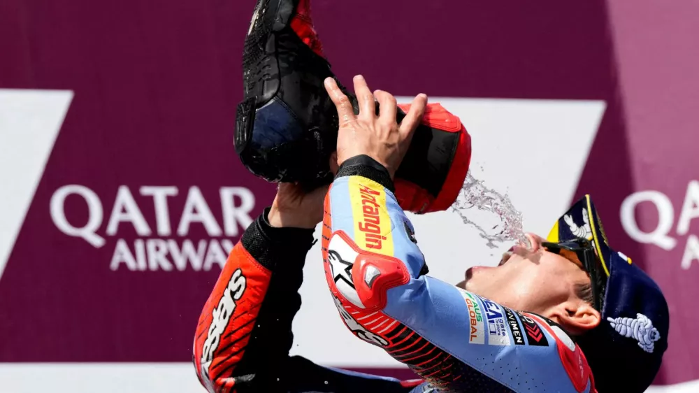 Španec Marc Marquez se je v Avstraliji veselil zmage v razredu moto, a nima možnosti, da bi postal svetovni prvak. Foto: Reuters