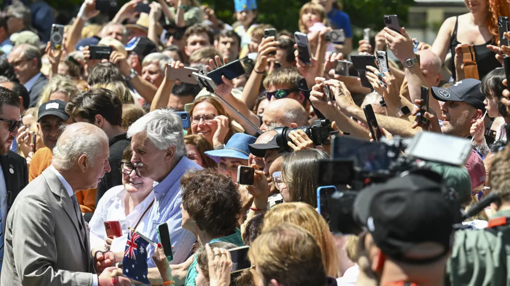 Britain's King Charles greets well wishers as they leave St Thomas' Anglican Church in Sydney, Sunday, Oct. 20, 2024. (Dean Lewins/Pool Photo via AP)