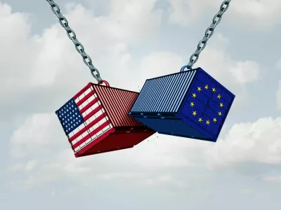 Europe USA trade war and American tariffs as two opposing cargo freight containers in European Union economic conflict as a dispute over import and exports as a 3D illustration. / Foto: Wildpixel