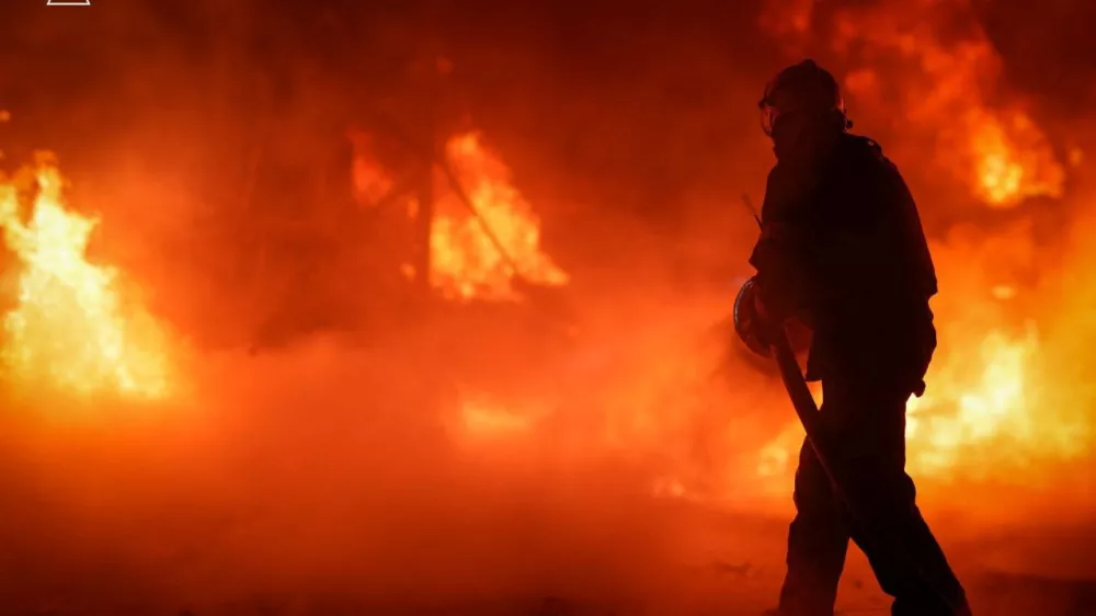 A firefighter works at a site of a Russian missile strike, amid Russia's attack on Ukraine, in Odesa, Ukraine, in this handout picture released October 21, 2024. Press service of the State Emergency Service of Ukraine in Odesa region/Handout via REUTERS ATTENTION EDITORS - THIS IMAGE HAS BEEN SUPPLIED BY A THIRD PARTY.