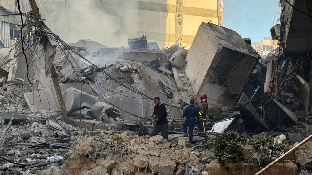 A civil defence member works at a site damaged in the aftermath of Israeli strikes on Beirut's southern suburbs, amid the ongoing hostilities between Hezbollah and Israeli forces, Lebanon, October 24, 2024. REUTERS/Ahmad Al-Kerdi