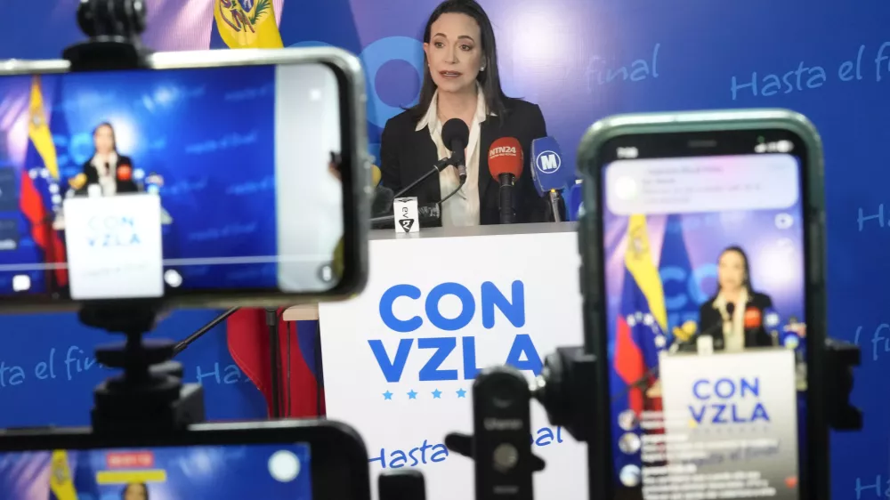 FILE - Opposition presidential hopeful Maria Corina Machado gives a press conference at her campaign headquarters in Caracas, Venezuela, Dec. 15, 2023. (AP Photo/Matias Delacroix, File)