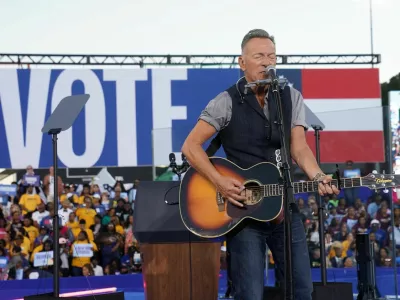 Bruce Springsteen performs during a rally for Democratic presidential nominee U.S. Vice President Kamala Harris in Atlanta, Georgia, U.S., October 24, 2024. REUTERS/Kevin Lamarque