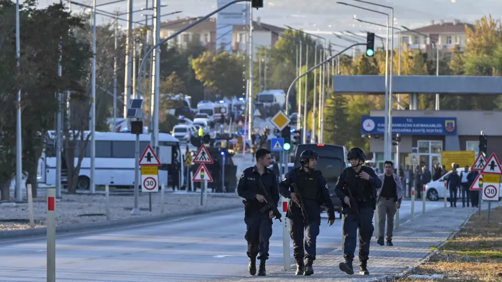 Emergency and security teams are deployed outside of Turkish Aerospace Industries Inc. at the outskirts of Ankara, Turkey, Wednesday, Oct. 23, 2024. (AP Photo)