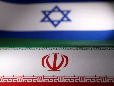 FILE PHOTO: Israeli and Iranian flags are seen in this illustration taken, April 24, 2024. REUTERS/Dado Ruvic/Illustration/File Photo